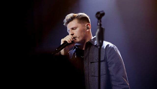 singer mic close to mouth